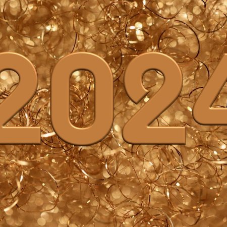 Das Jahr 2024 in Gold auf hellgoldenem glitzernden Hintergrund